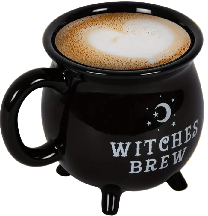 Black 'Witches Brew' mug with a hot beverage on an orange background