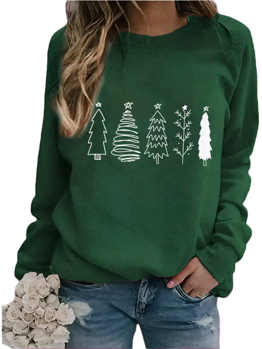 Green sweatshirt with white Christmas tree designs worn by a person, holding flowers.