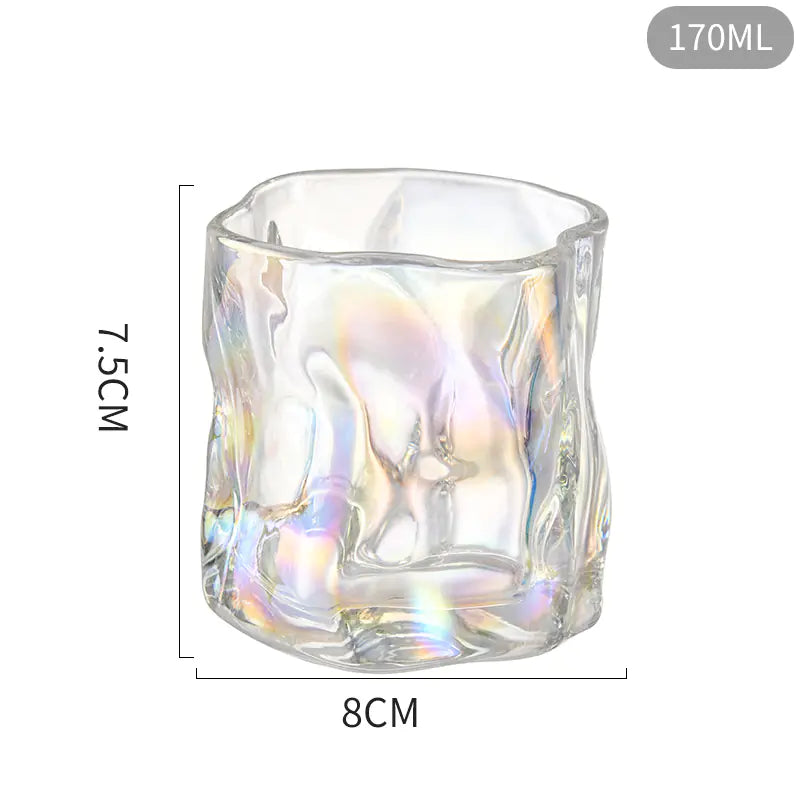 Glass tumbler with measurements on a white background