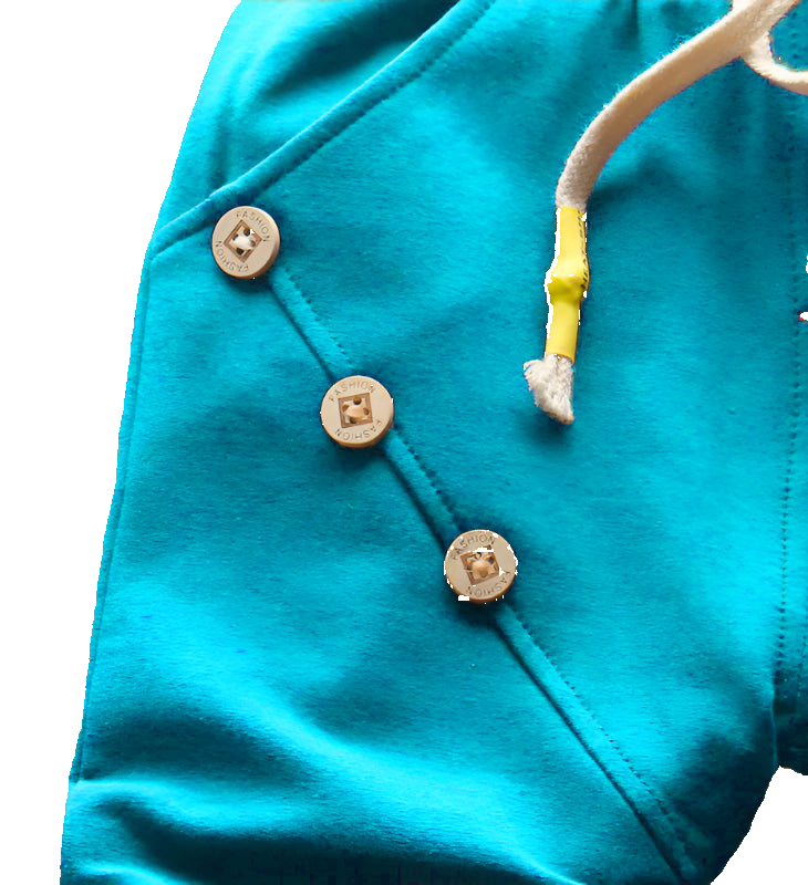 Close-up of a turquoise garment with buttons on a woven surface