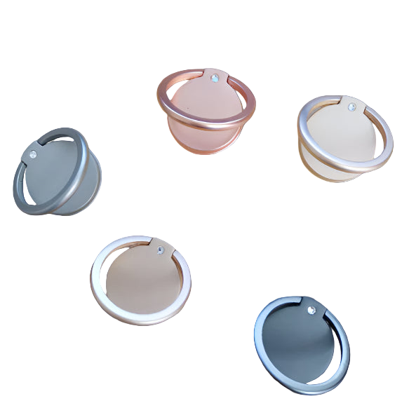 Five phone ring holders in different colors on a wooden surface