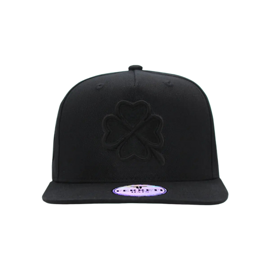 Black cap with a clover design on a white background
