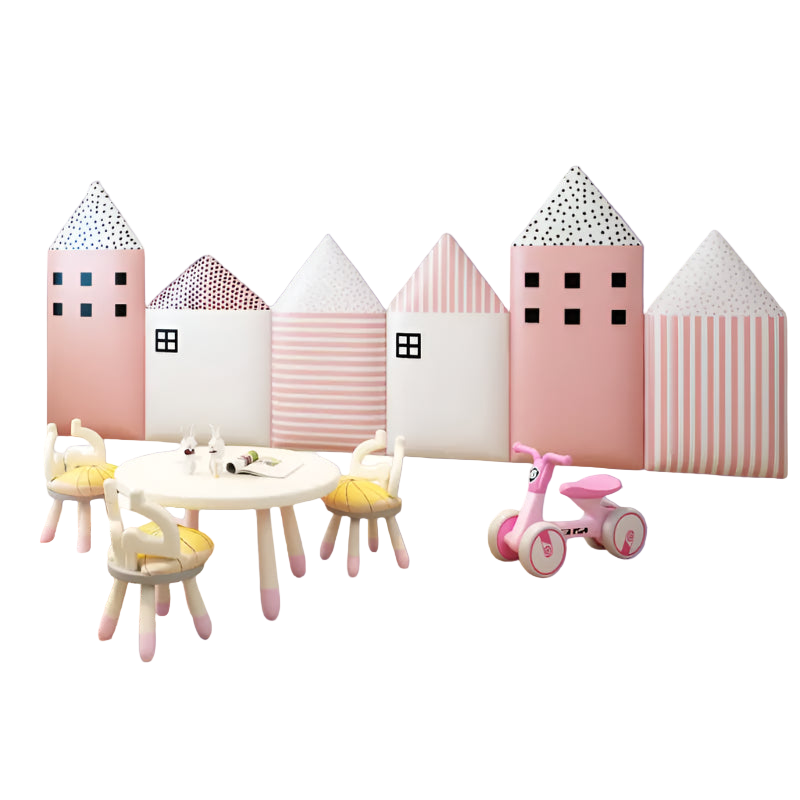 Children's play area with toy table, chairs, and tricycle in front of patterned wall panels.