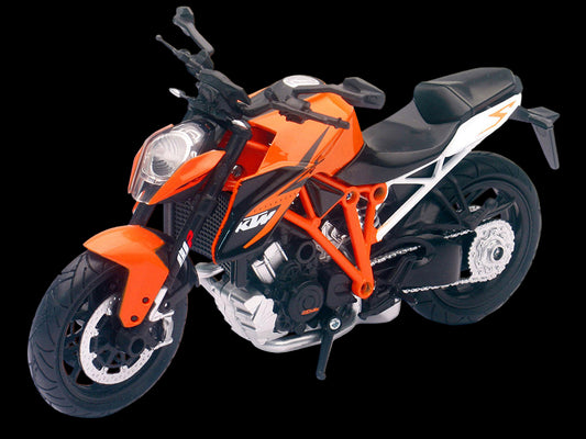 Model motorcycle with orange and black design on a white background