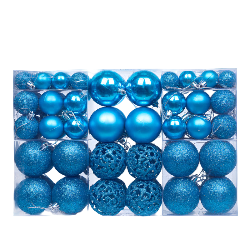 Assorted blue Christmas ornaments in a clear box on a white background