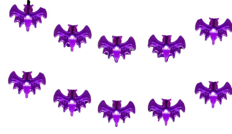 Halloween-themed decorations with purple bat lights and carved pumpkins.