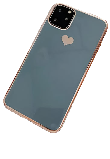 Phone case with heart design on a white surface with a cup and clipboard.