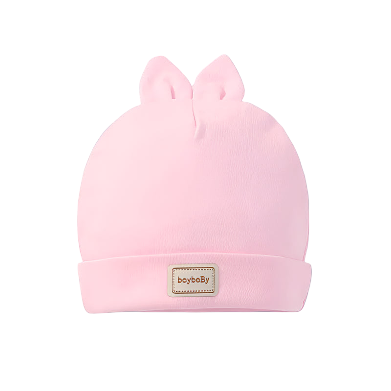 Pink baby hat with bunny ears and 'boyboBy' label on a white background