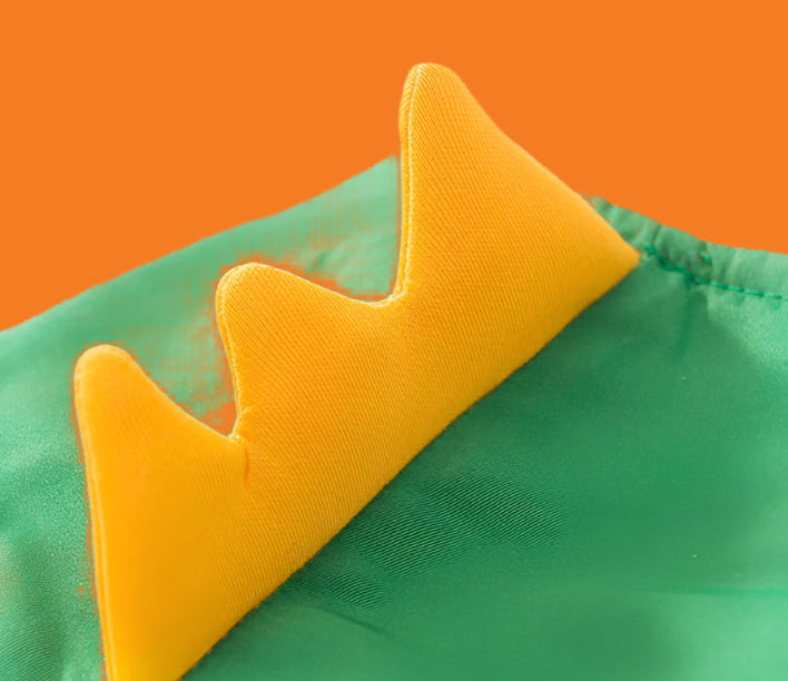 Green dinosaur costume with yellow spikes on a white background