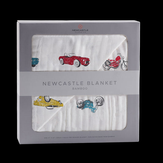 Newcastle blanket with vehicle designs in packaging