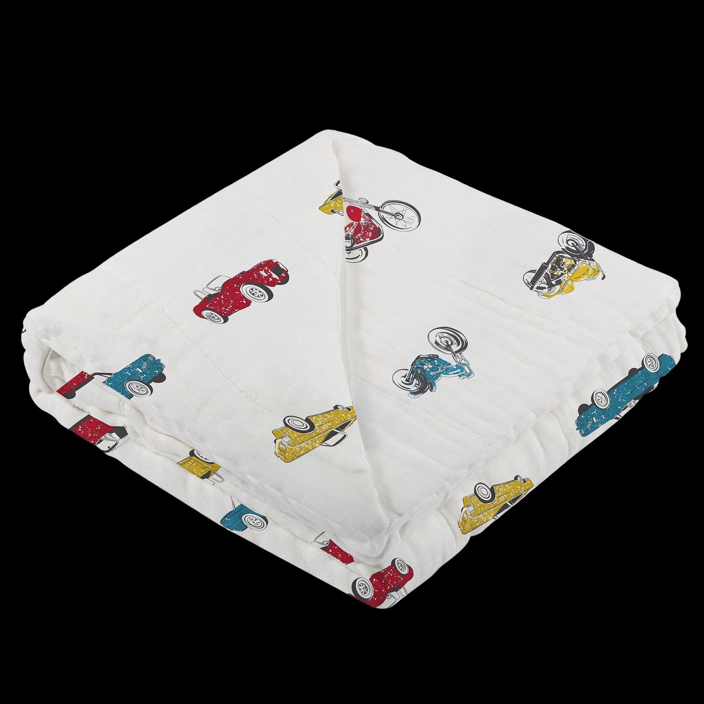 Folded blanket with cartoon car pattern on a white background