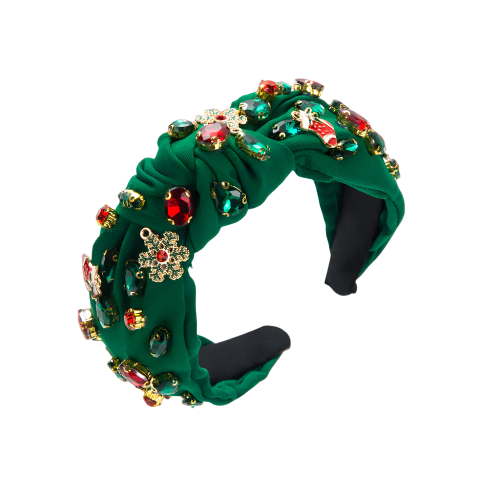 Green headband with colorful gemstones on a white background