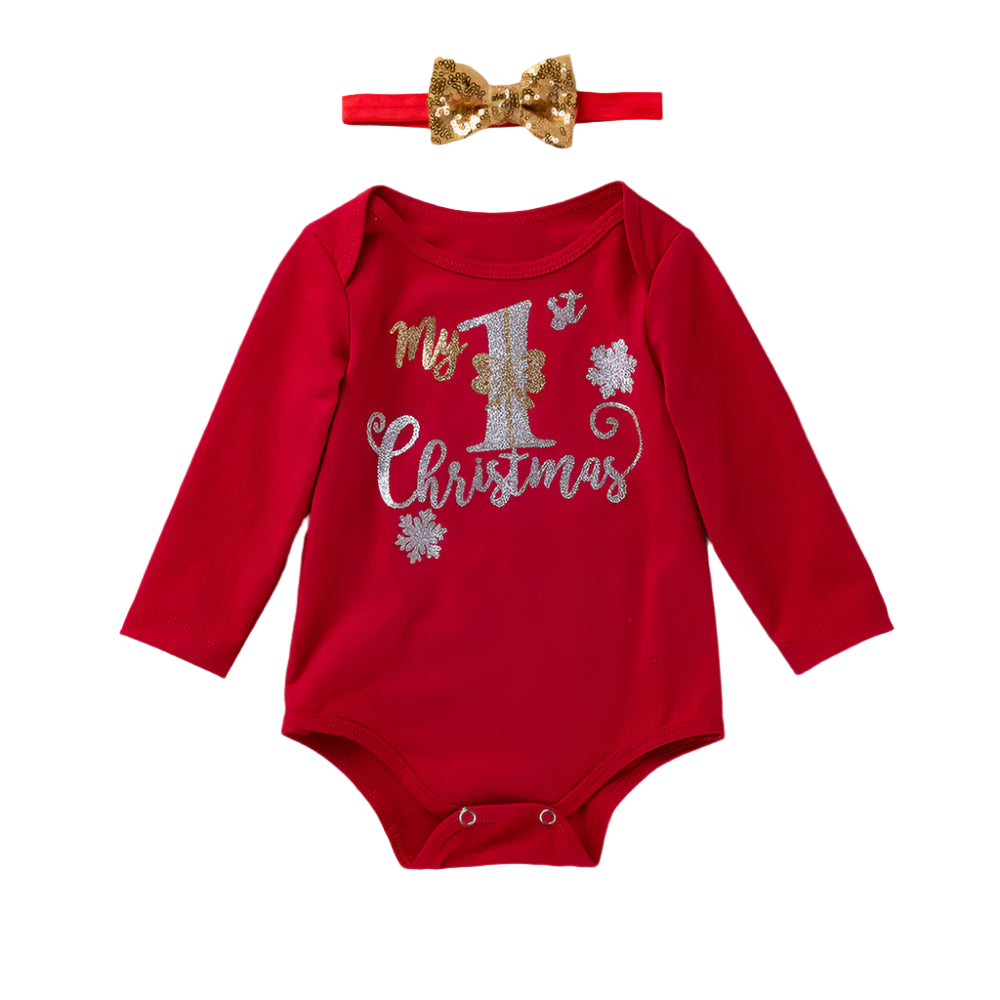 Red 'My 1st Christmas' baby bodysuit with gold bow headband on wooden surface