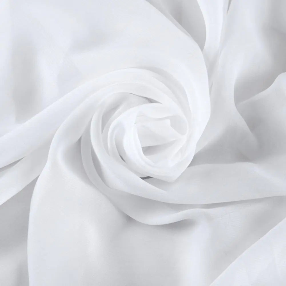 Close-up of white fabric with folds