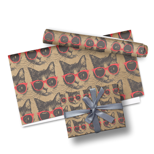 Roll of wrapping paper with cat design and a ribbon on a white background