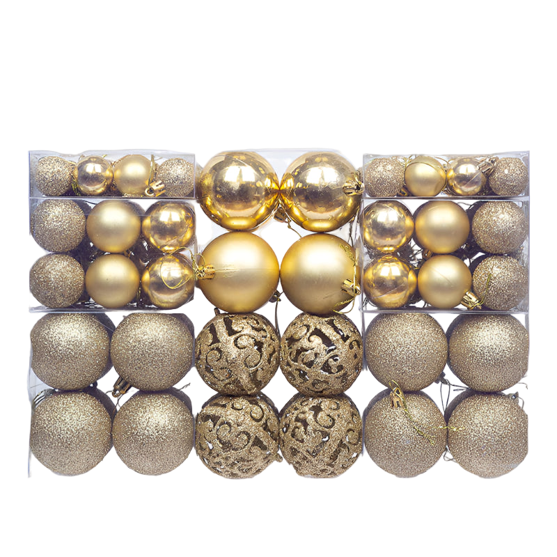 Assorted gold Christmas ornaments in a clear packaging box on a white background