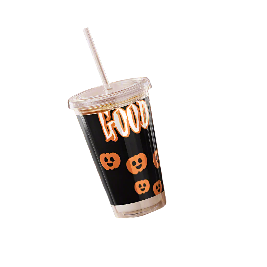 Hand holding a Halloween-themed tumbler with pumpkins and the word 'HOCUS'.