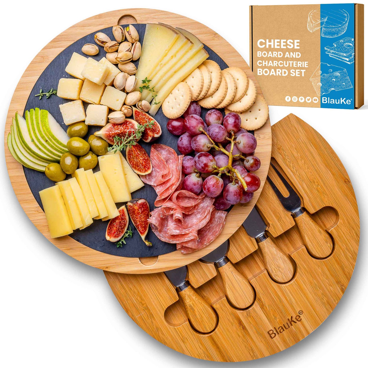 Cheese board and charcuterie board set with fruits, meats, and cheeses on a white background