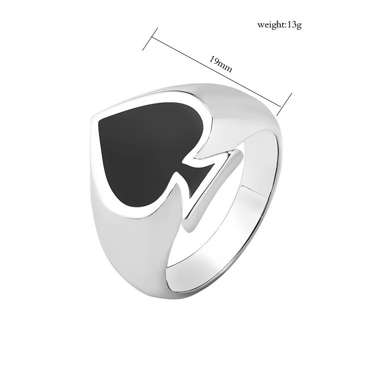 Silver ring with black heart-shaped inset and measurements on a white background