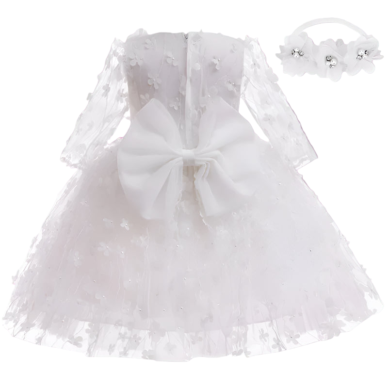 White lace dress with a large bow and matching headband on a white background