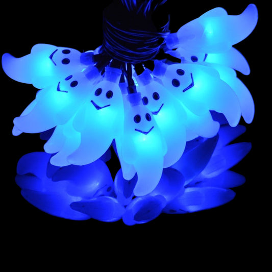 String lights shaped like ghosts with blue LED lights on a black background