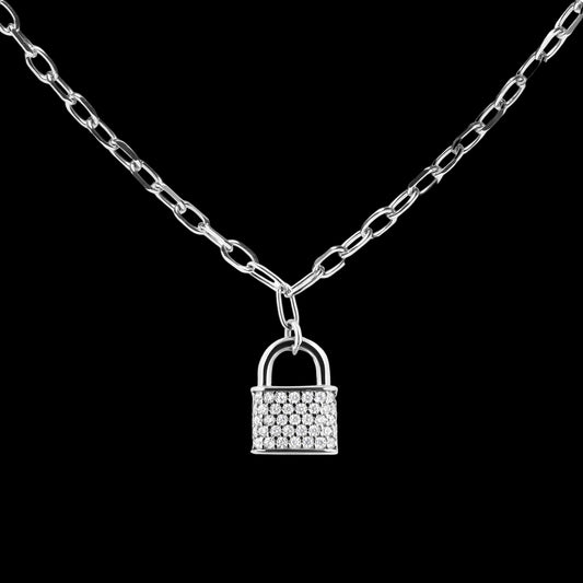 Silver necklace with a lock-shaped pendant on a white background