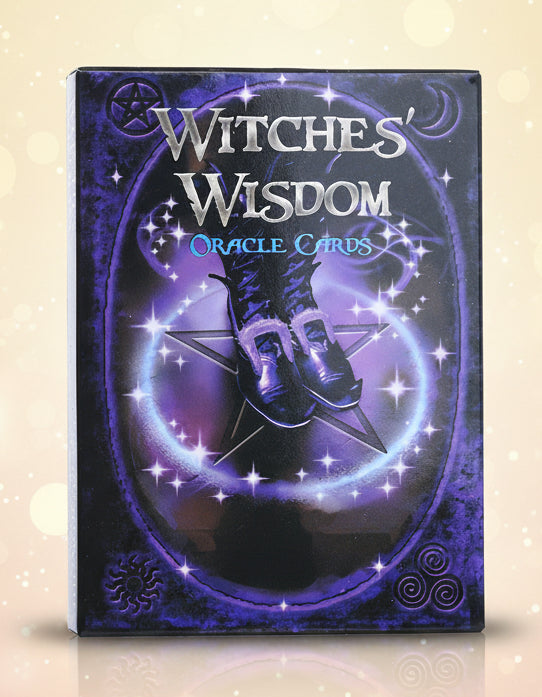 Box of 'Witches' Wisdom Oracle Cards' with a purple and black design.