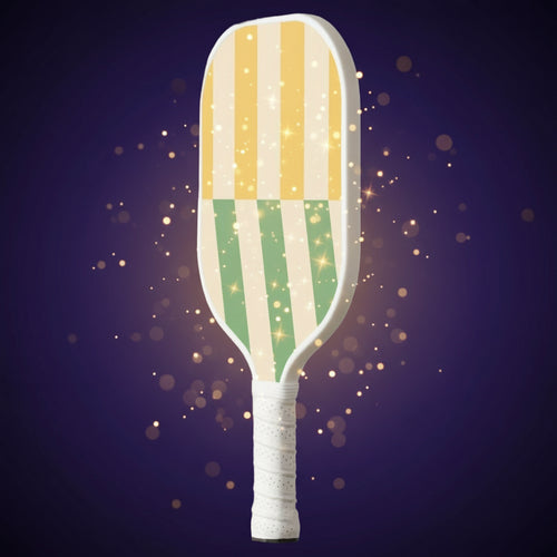 Striped paddle with yellow, green, and white colors on a light gray background