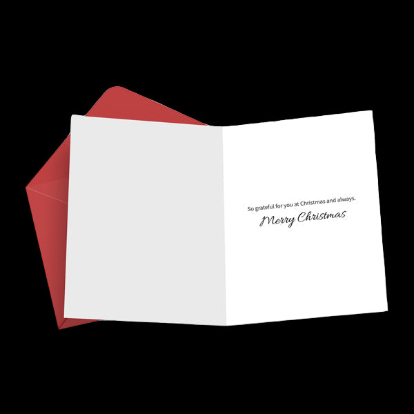 White Christmas card with red envelope on a white background
