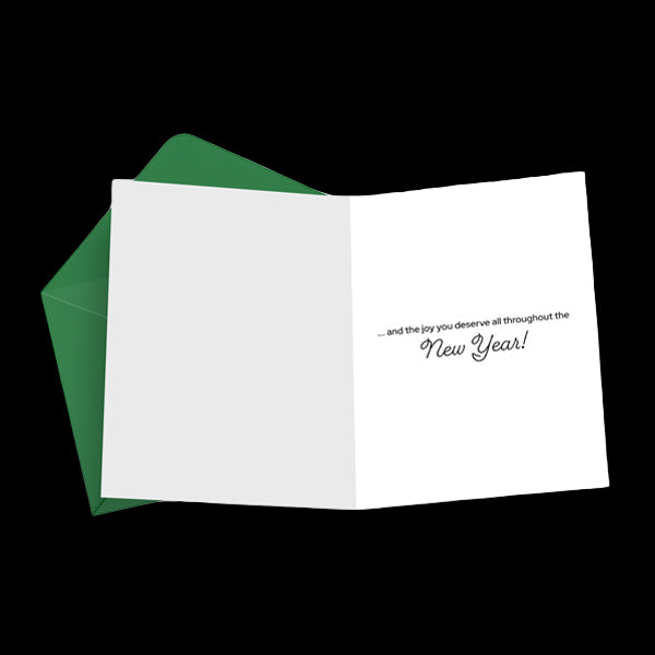 White card with green envelope on a white background