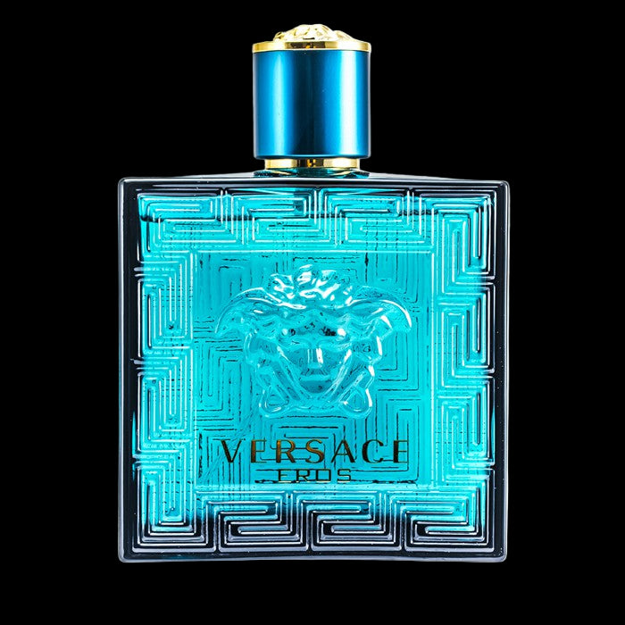 Versace perfume bottle with blue design and gold cap on a white background