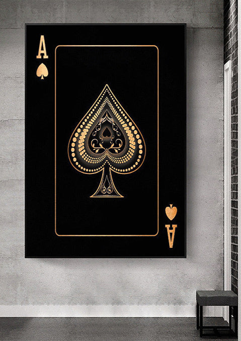 Black and gold playing card design on a wall in a hallway
