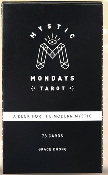 Black tarot card deck with 'Mystic Mondays Tarot' branding on a white background