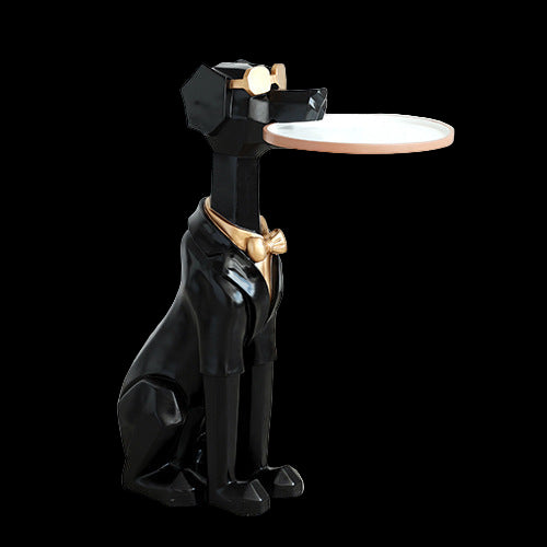 Black dog-shaped stool with a round seat on a light wooden floor.