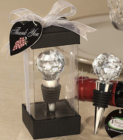 Crystal wine bottle stoppers with decorative packaging and 'Thank You' tag.