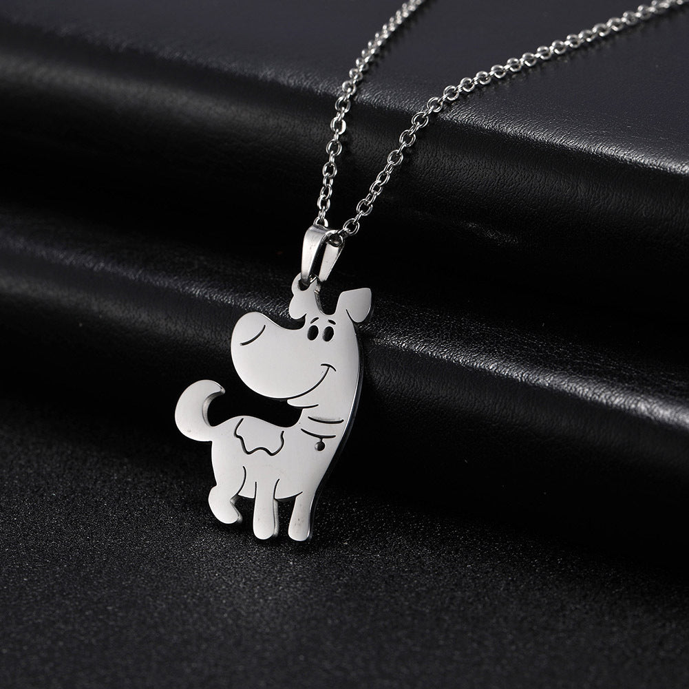Silver dog-shaped pendant necklace on a black background