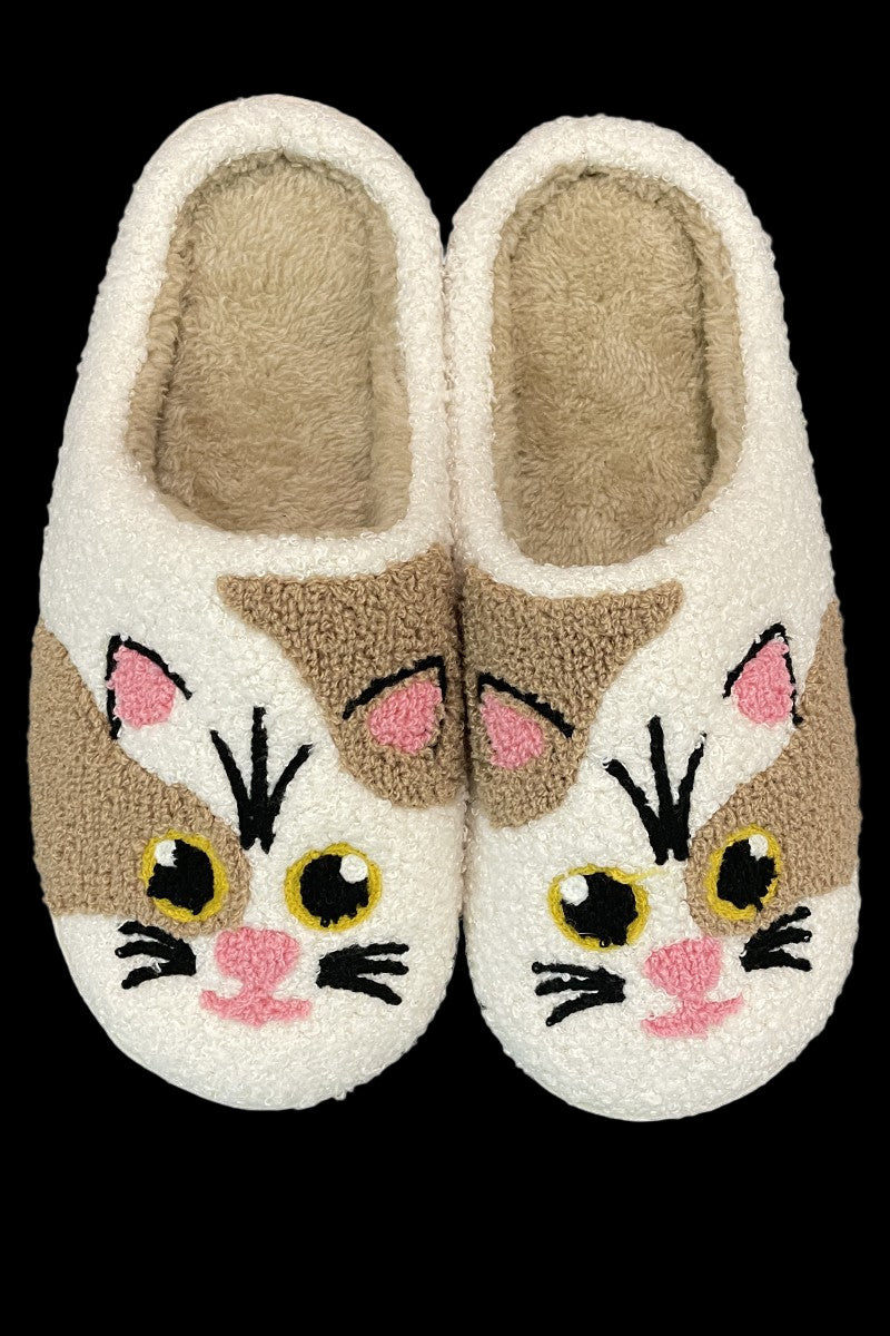 Pair of slippers with cat face design on a white background