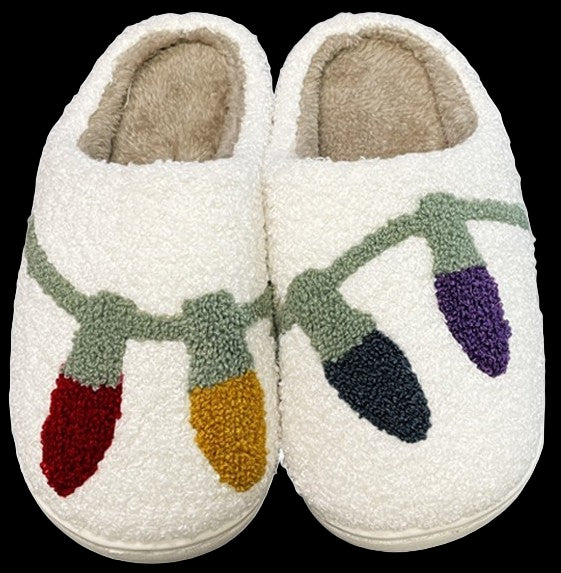 Pair of white slippers with colorful light bulb design on a white background