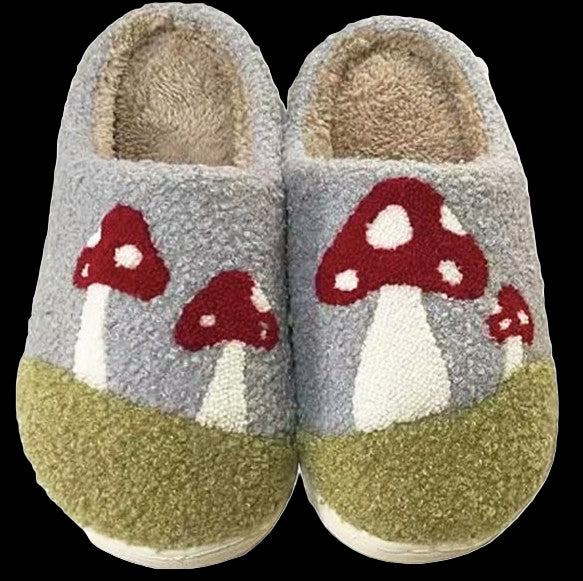 Pair of slippers with mushroom design on a white background