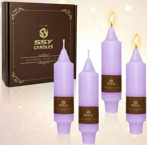 Purple candles with brown labels in front of an SSY Candles branded box on a white background