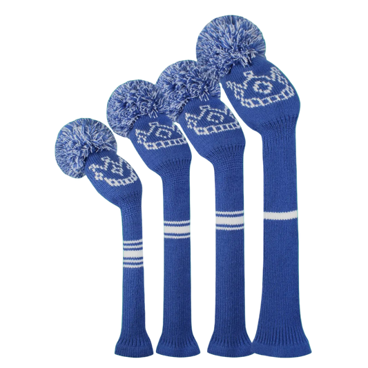 Set of blue knitted golf club heads with pom-poms on a white background