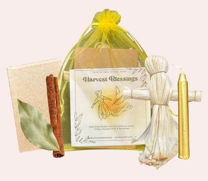 Harvest-themed gift set with candle, cinnamon stick, and decorative items on a white background