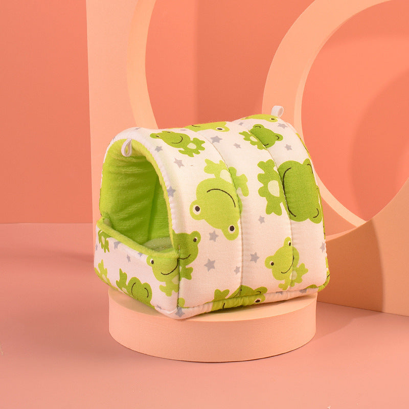 Pet tunnel with green frog pattern on a pink background
