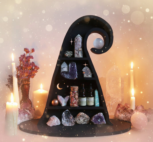 Decorative shelf with crystals and candles in a mystical setting