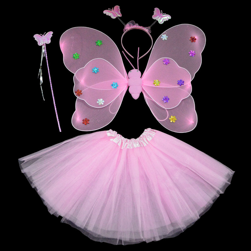 Pink fairy costume set with wings, wand, and headband on a black background