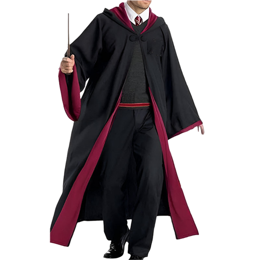 Person wearing a black robe with red trim, holding a wand on a white background