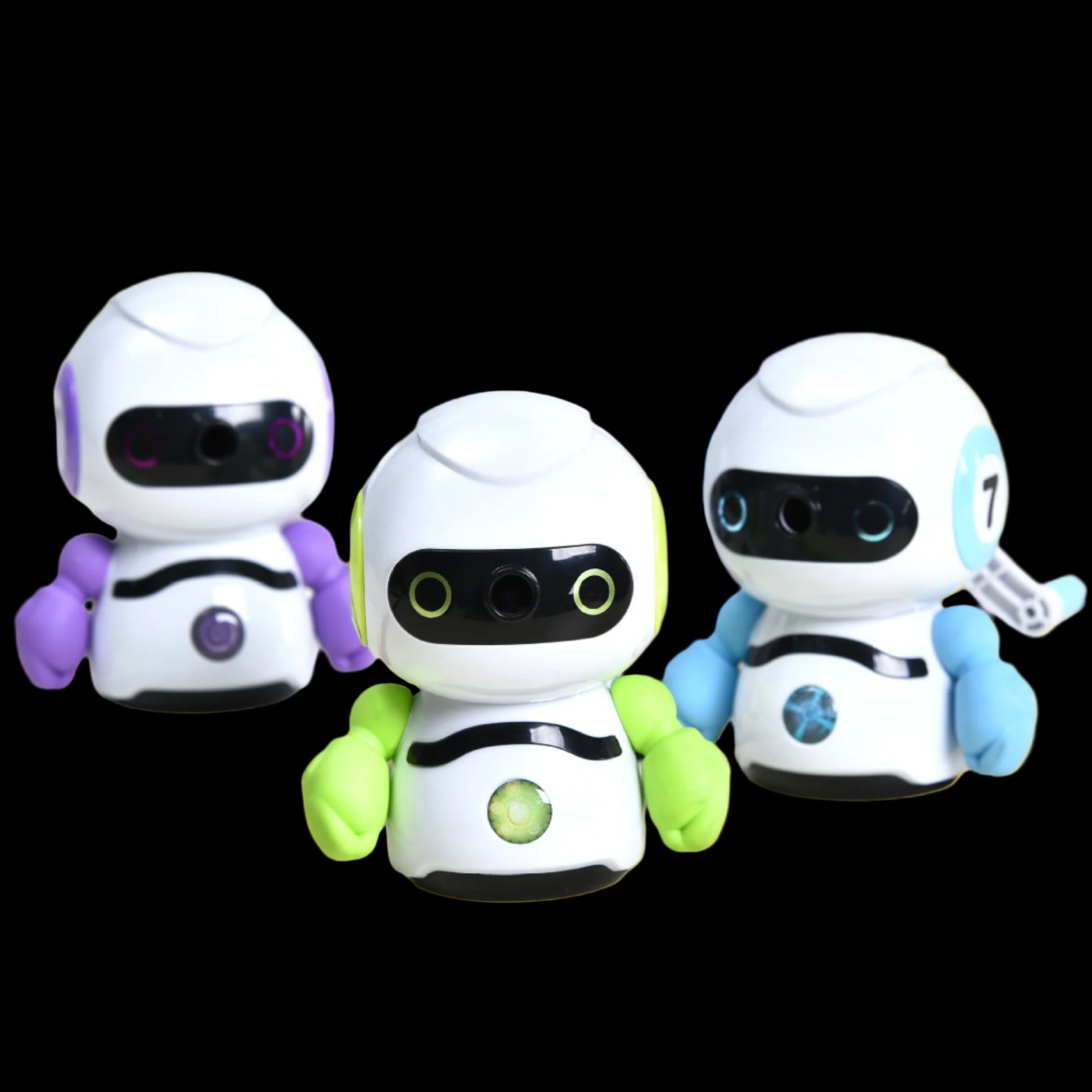 Three toy robots with different colored bodies on a light surface.