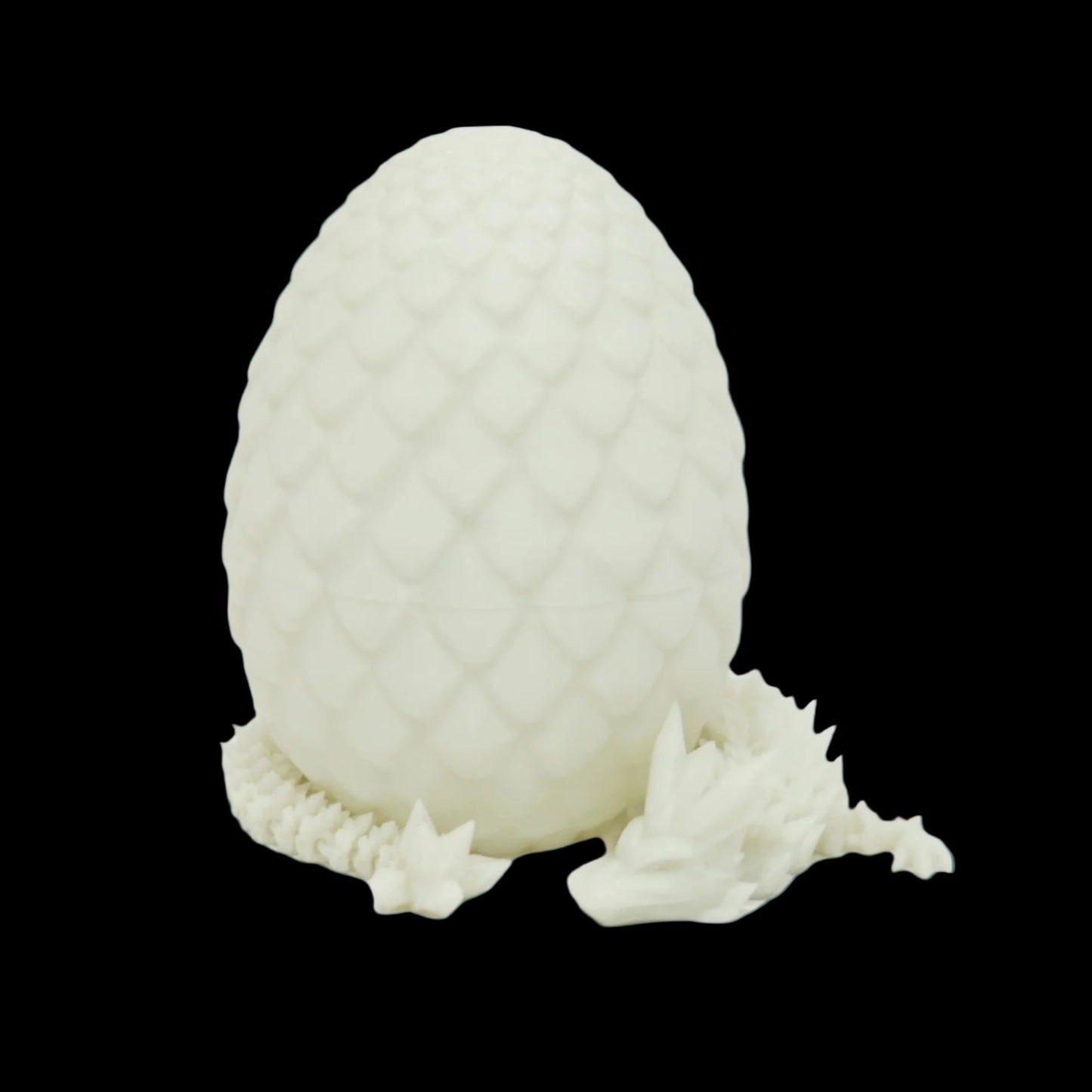 White textured object resembling a dragon egg on a white background