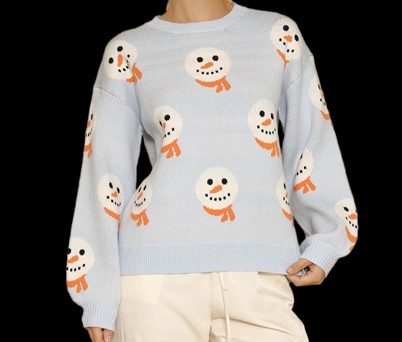 Person wearing a light blue sweater with snowman patterns on a beige background
