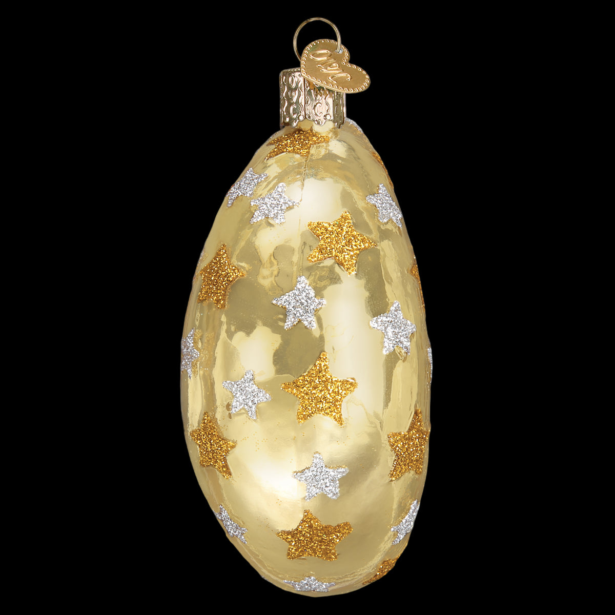 Decorative glass ornament with gold and silver stars on a white background